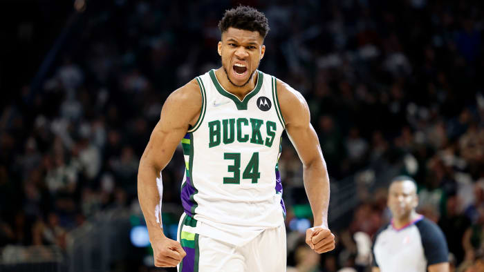 Milwaukee Bucks forward Giannis Antetokounmpo (34) reacts after scorring during the third quarter against the Boston Celtics.
